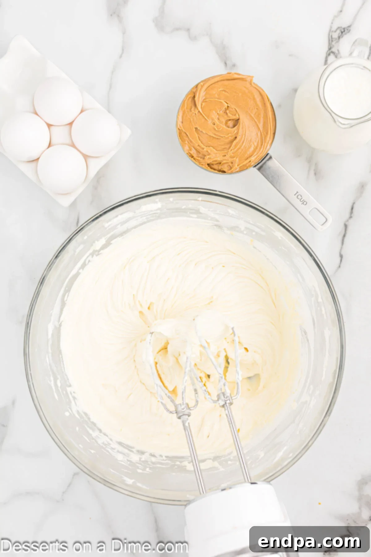 Sugar and vanilla combined in bowl. 