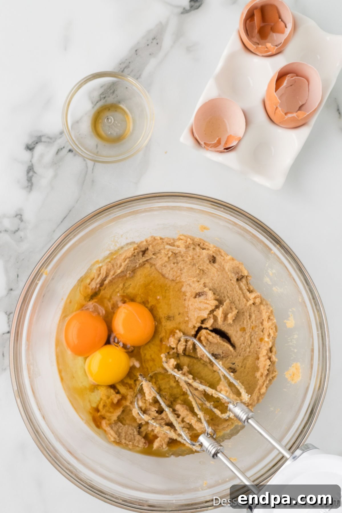 Eggs mixed into butter mixture. 