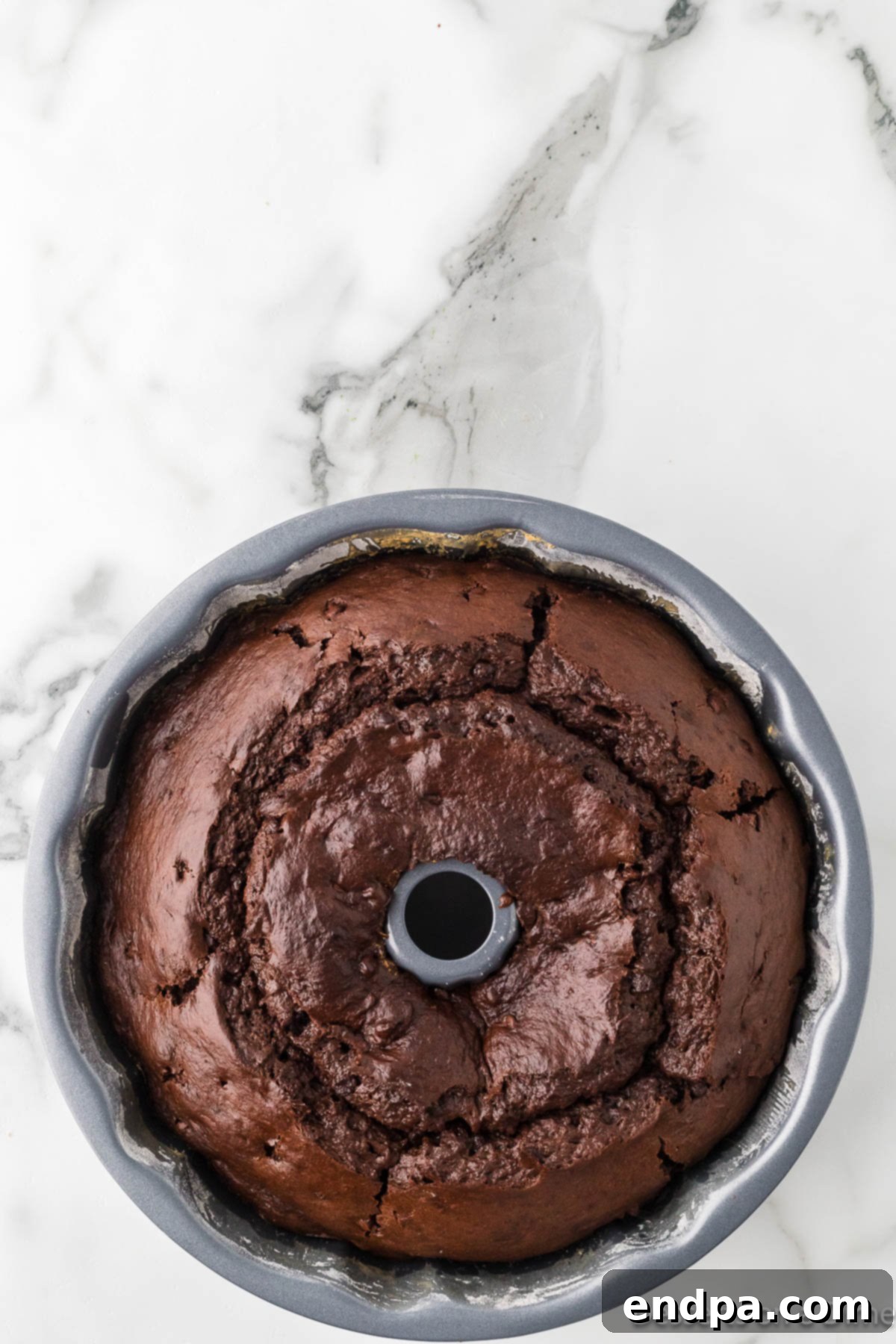 Cake baked in pan and cooling. 