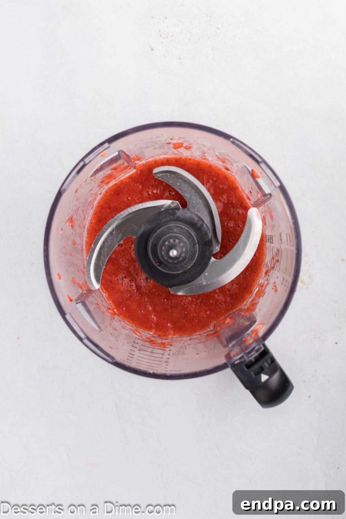 Sweetheart Swirl Cupcakes 5 Strawberry puree in a food processor.