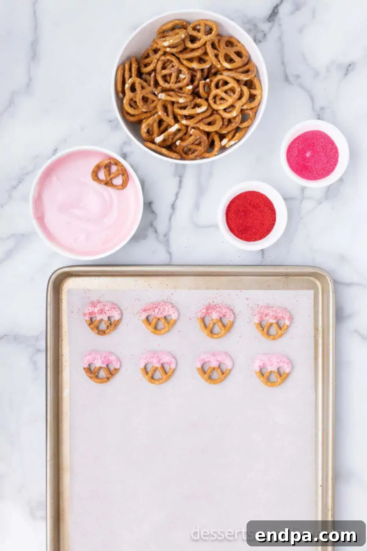 Sweet and Salty Valentine Pretzel Delights 4 Pretzels with chocolate and sprinkles.