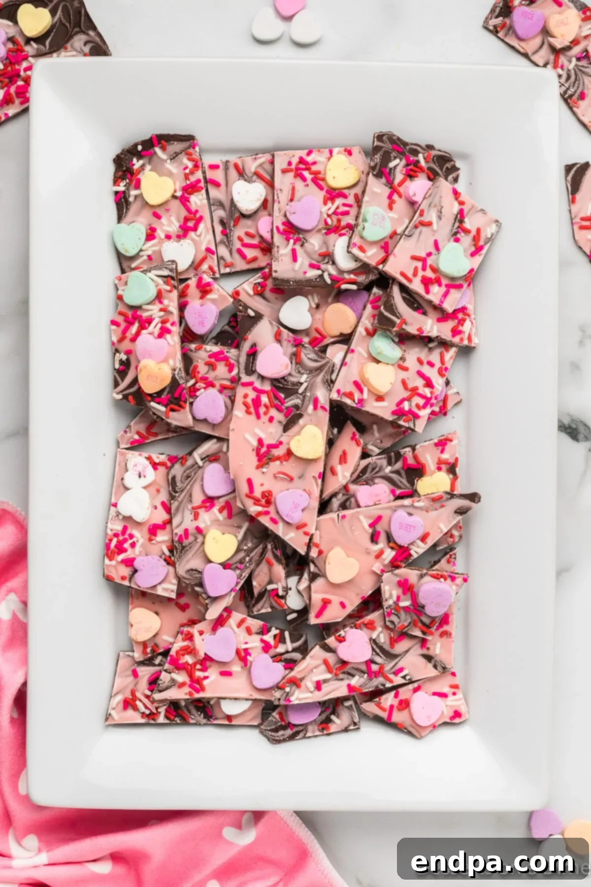 A festive platter of broken Valentine Bark pieces, ready for serving.