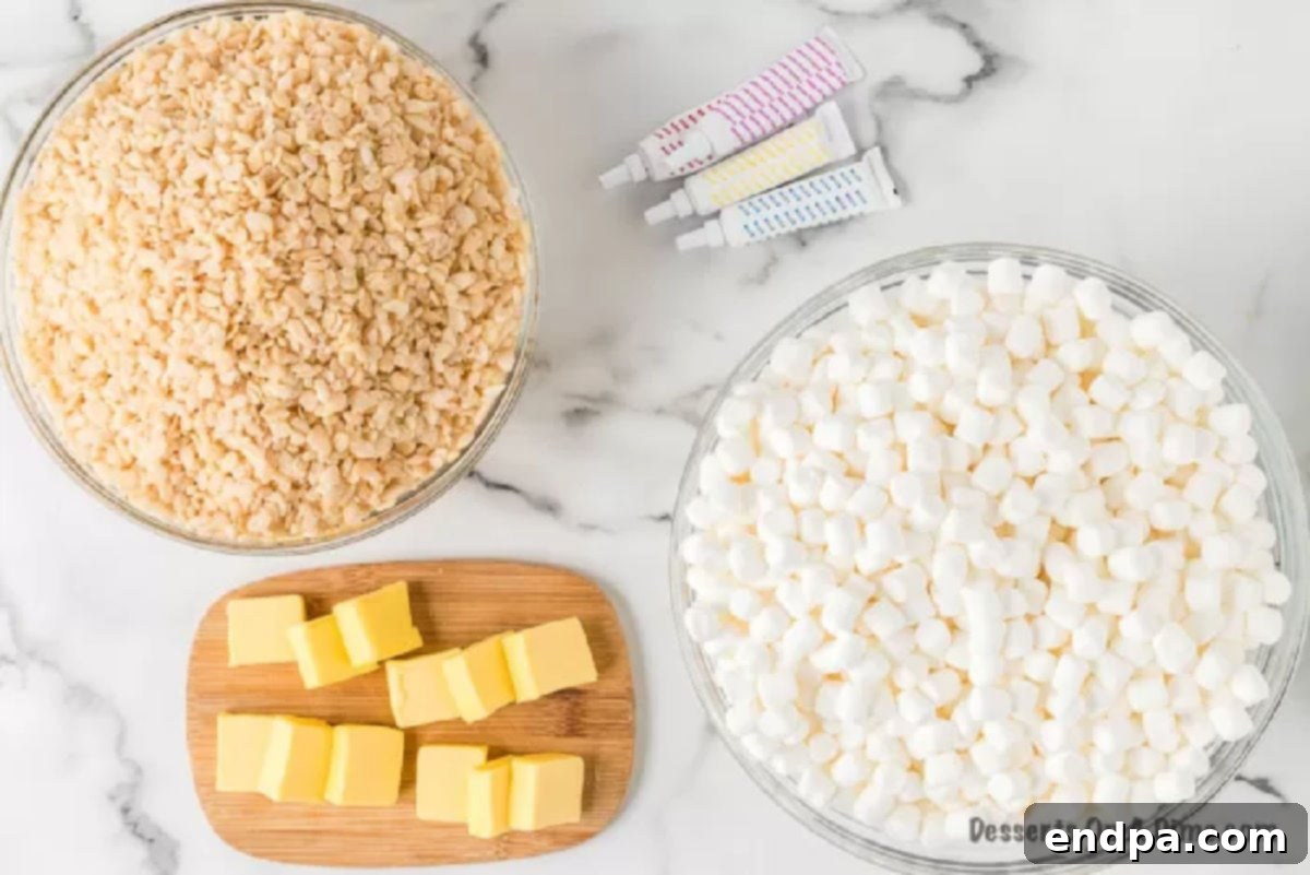 Ingredients for Rice Krispie Easter Egg Treats: mini marshmallows, butter, Rice Krispies cereal, and various food colorings.