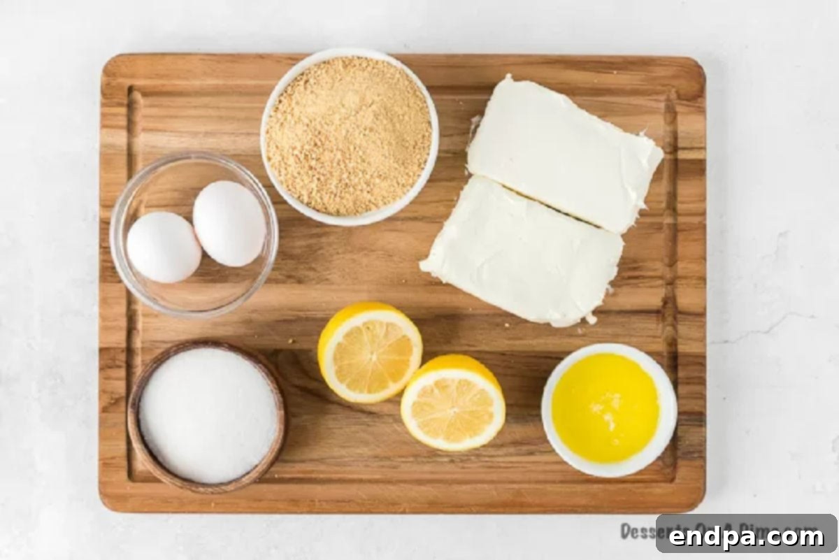 Zesty Lemon Cheesecake Bars 3 Ingredients needed for lemon cheesecake bars: graham crackers, butter, cream cheese, sugar, lemon zest, lemon juice, and eggs.