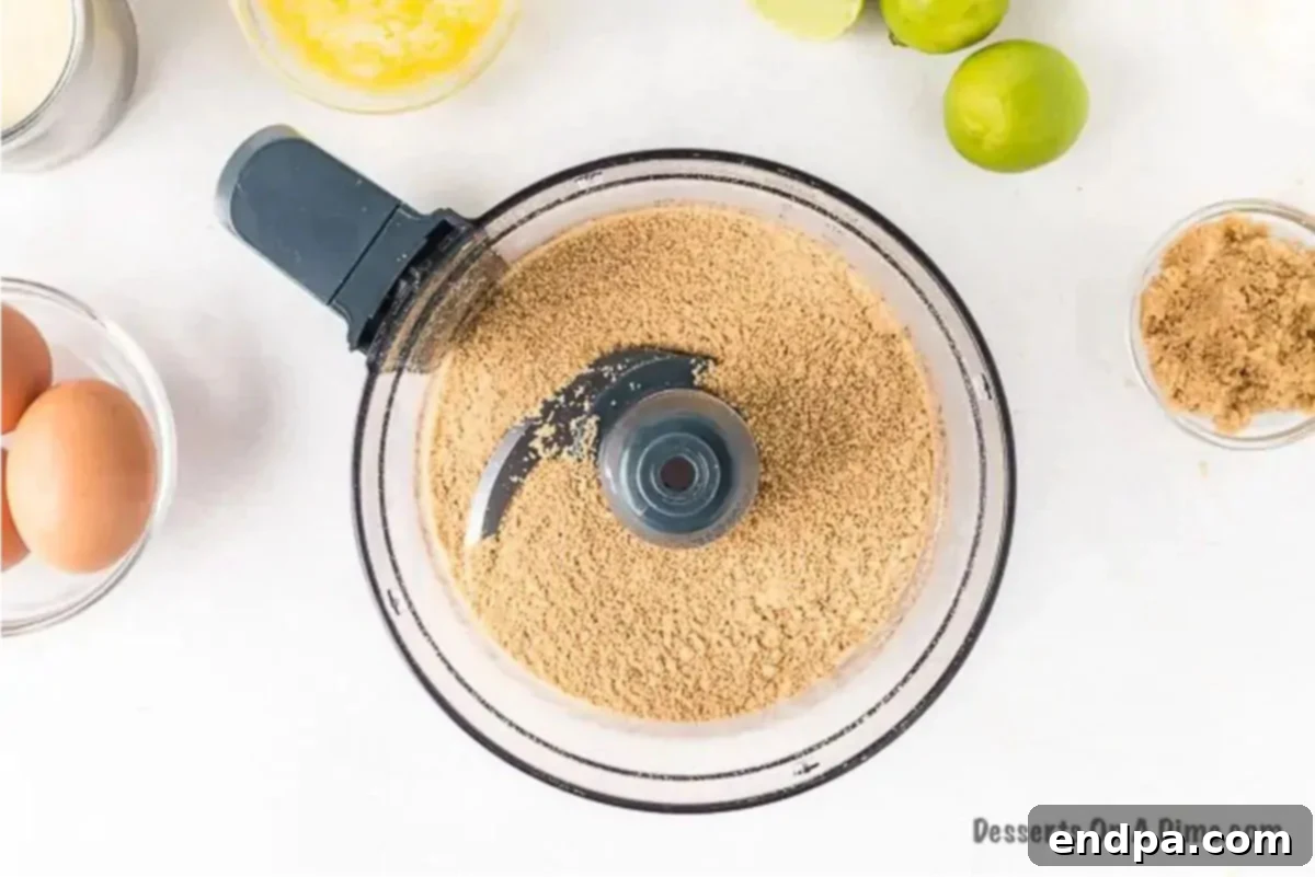 Zesty Key Lime Squares 2 Graham cracker crumbs in food processor.