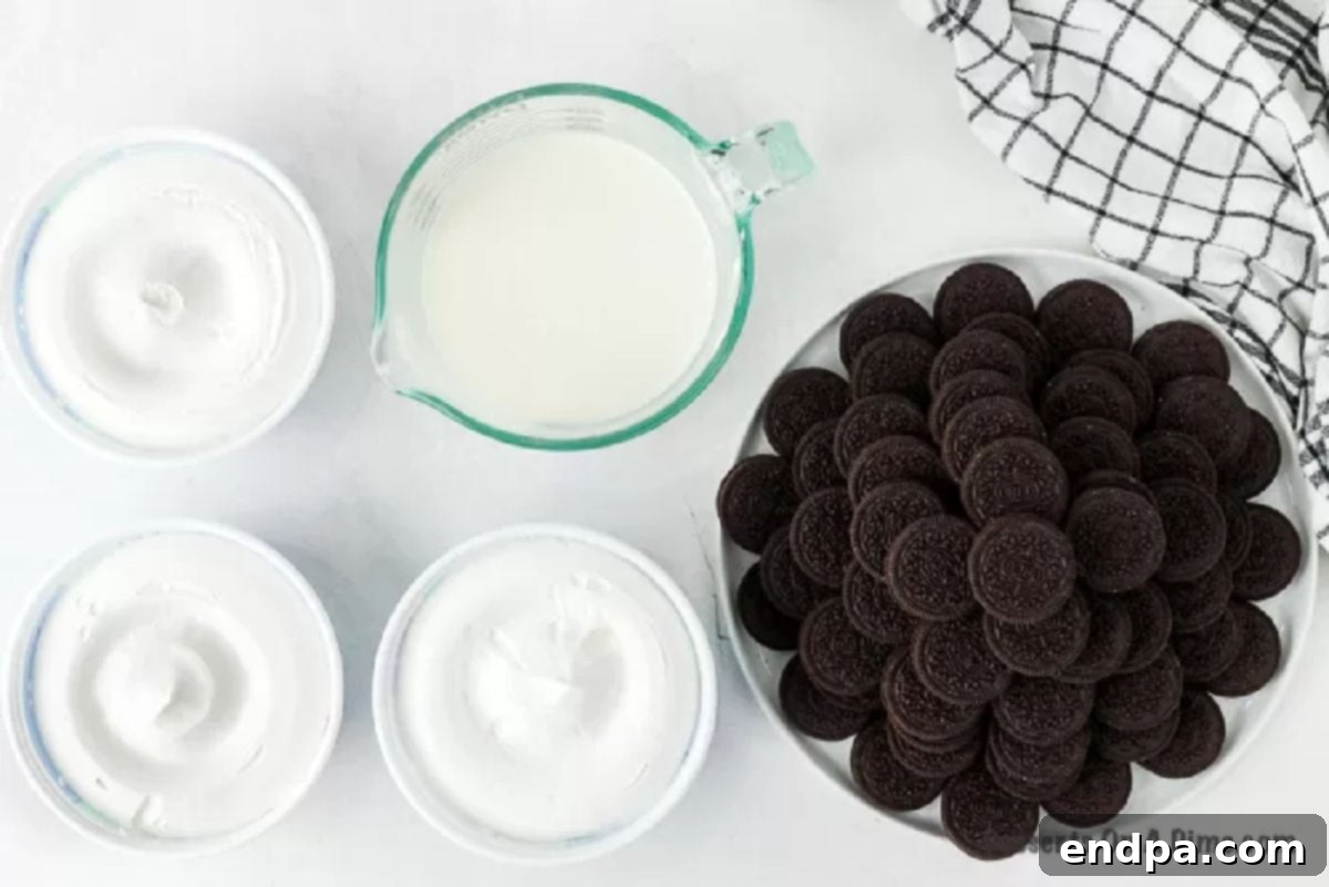 Ingredients for Oreo icebox cake. - whipped cream, milk, Oreo Cookies.