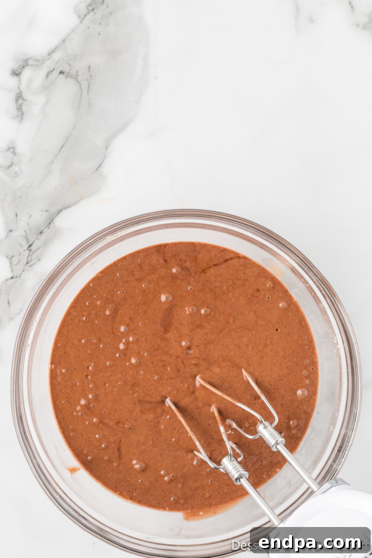 Decadent Layered Chocolate Trifle 5 Mixing bowl with cake mix ingredients.