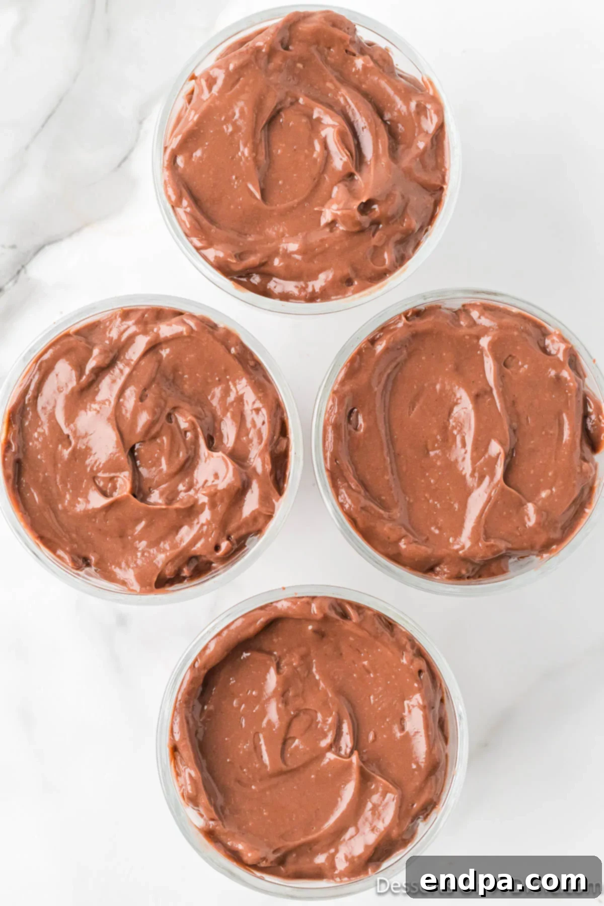 Decadent Layered Chocolate Trifle 9 Pudding layered on top of cake.