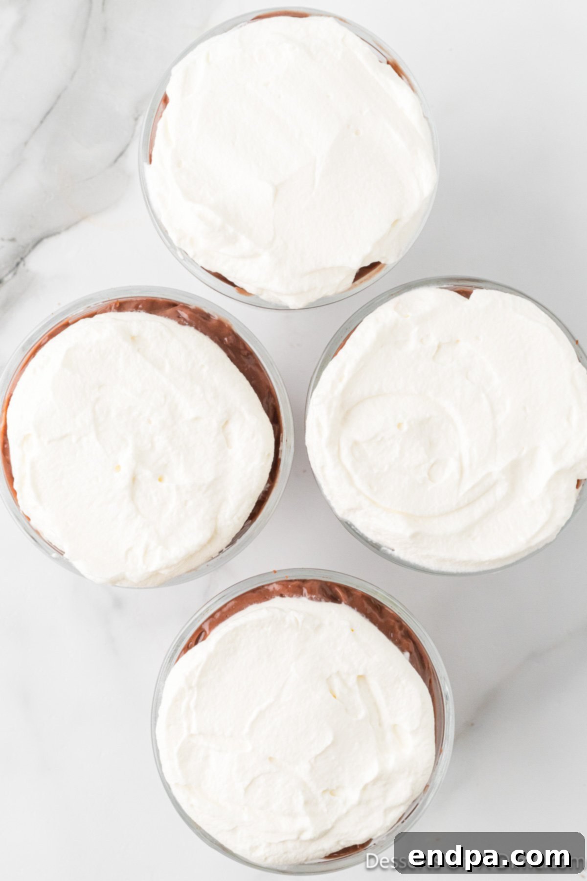 Decadent Layered Chocolate Trifle 10 Cool whip spread on top.