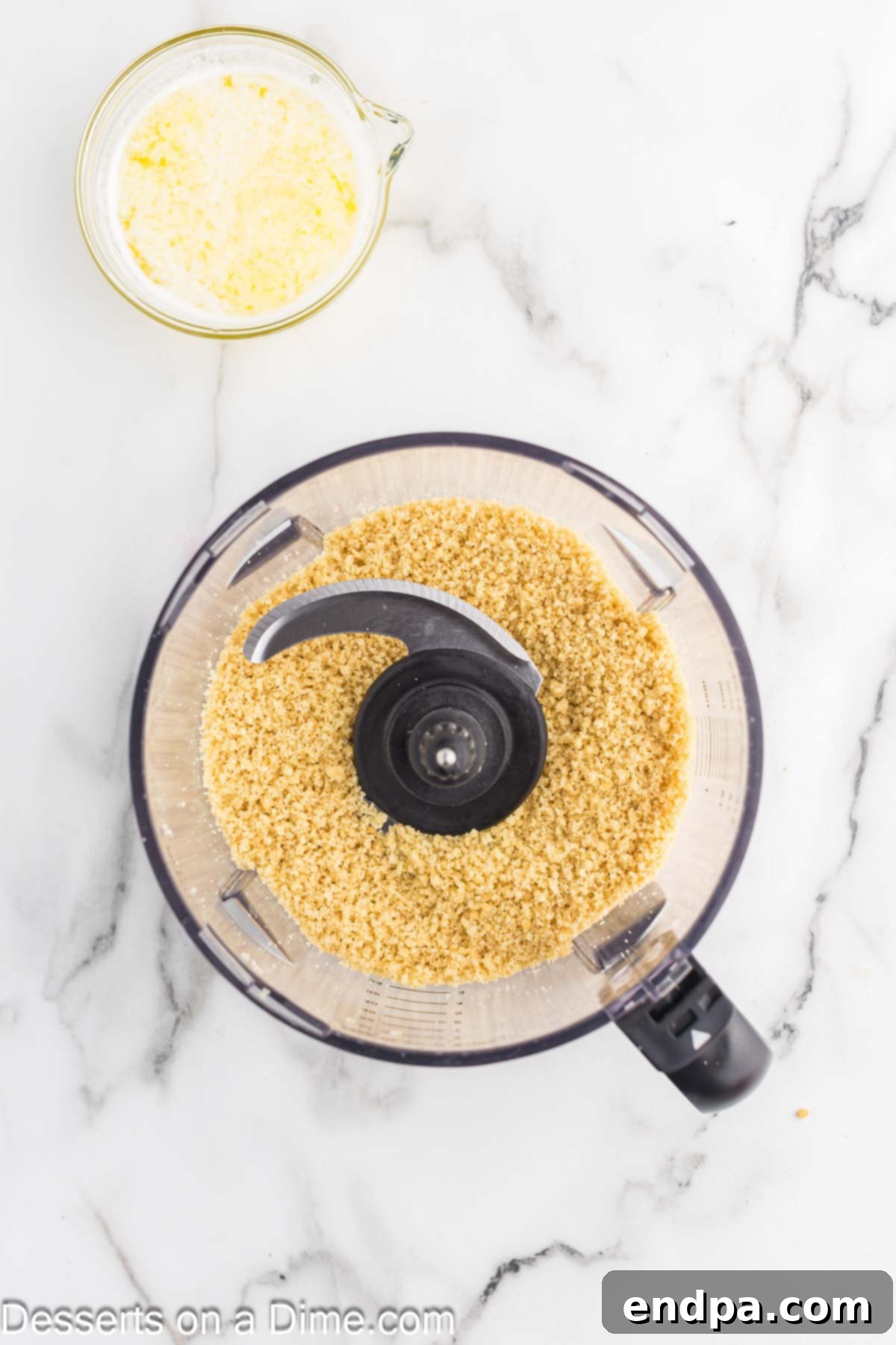 Cookie crumbs in food processor.