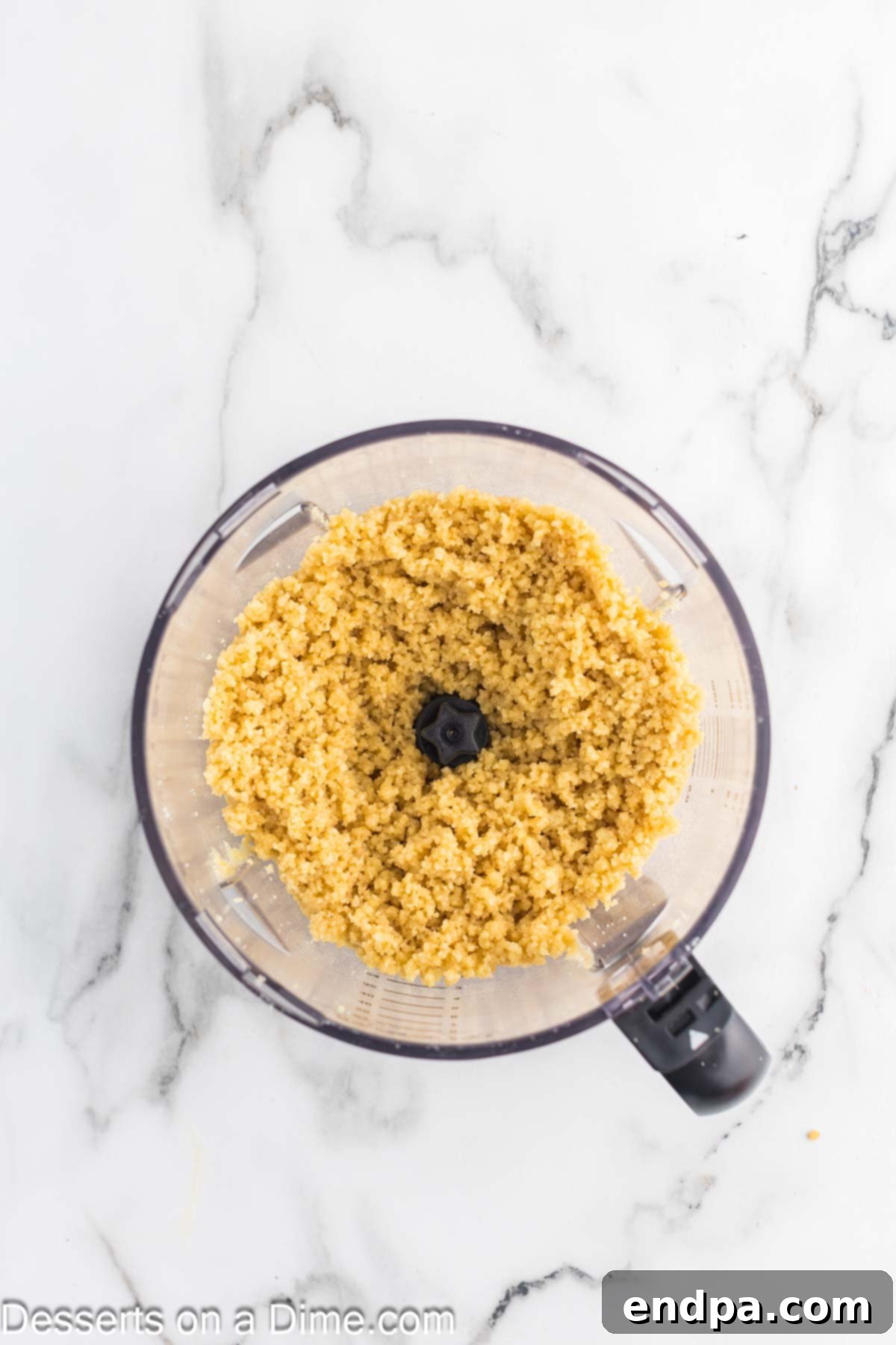 Melted butter added to crumbs and combined.