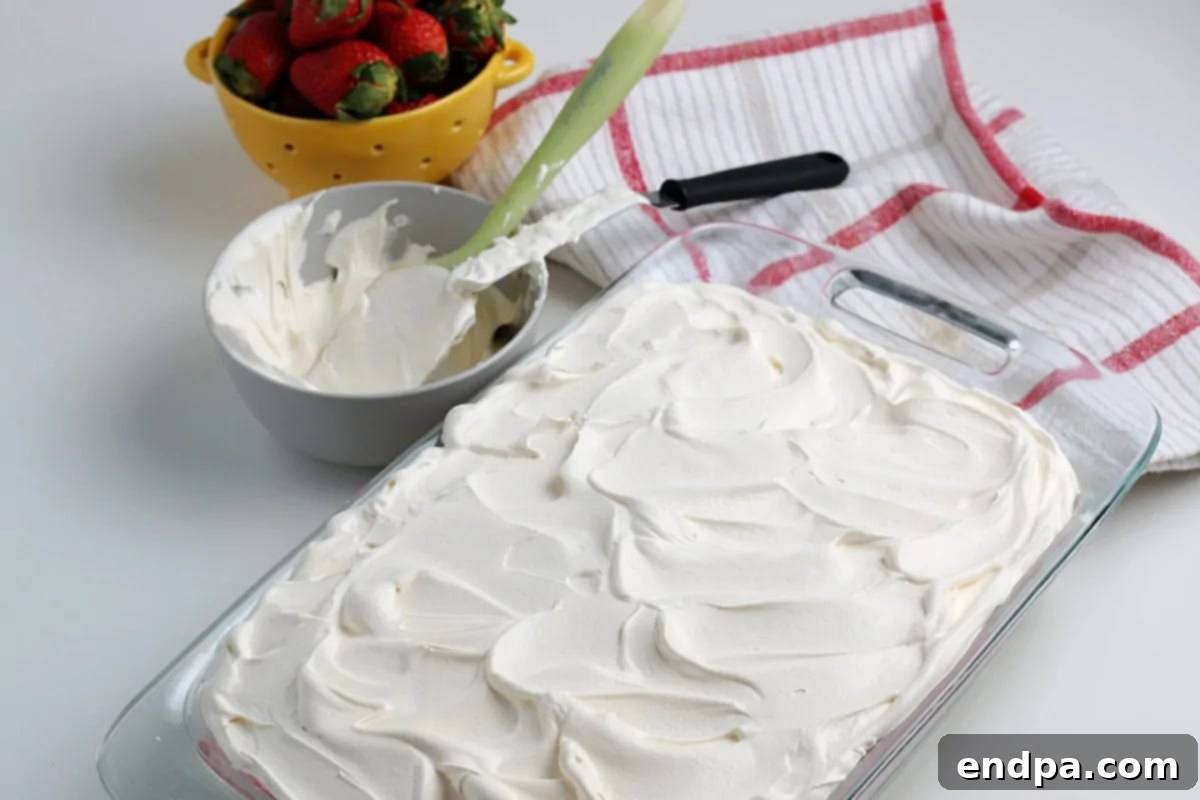 Cool whip spread over top of mixture. 