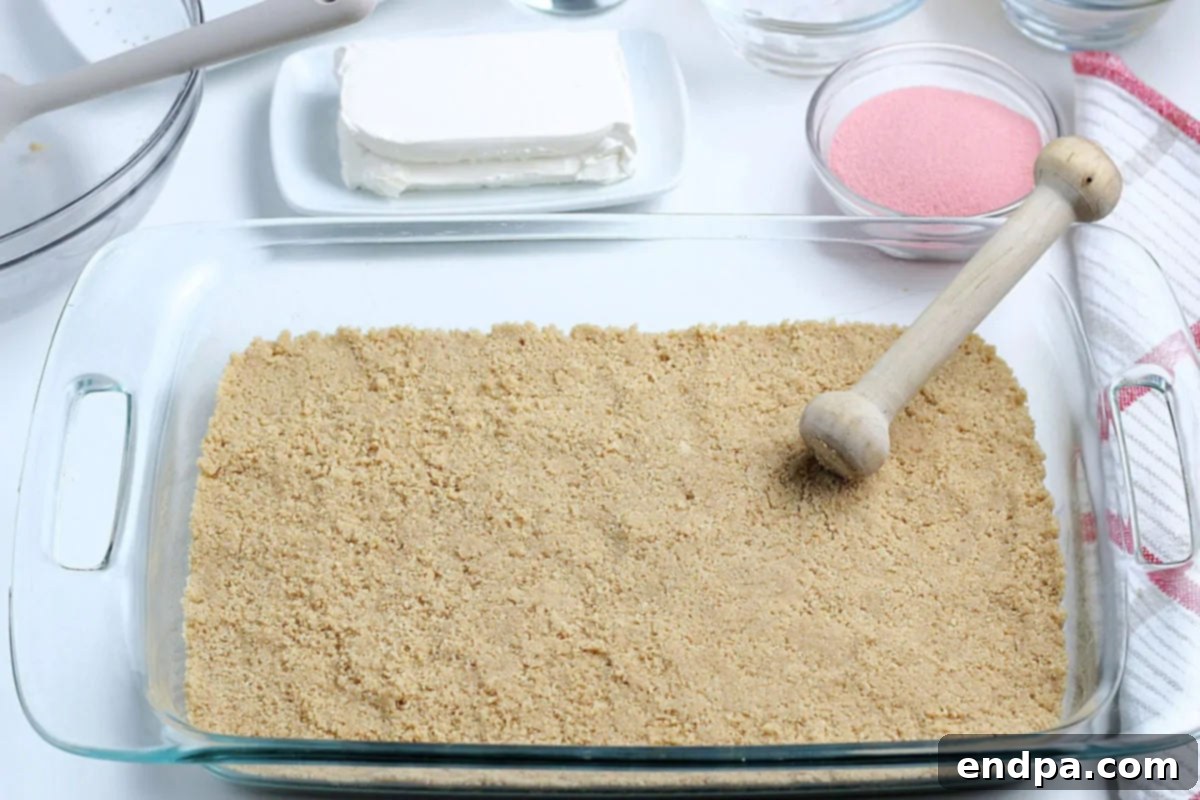Crumbs pressed into baking dish. 
