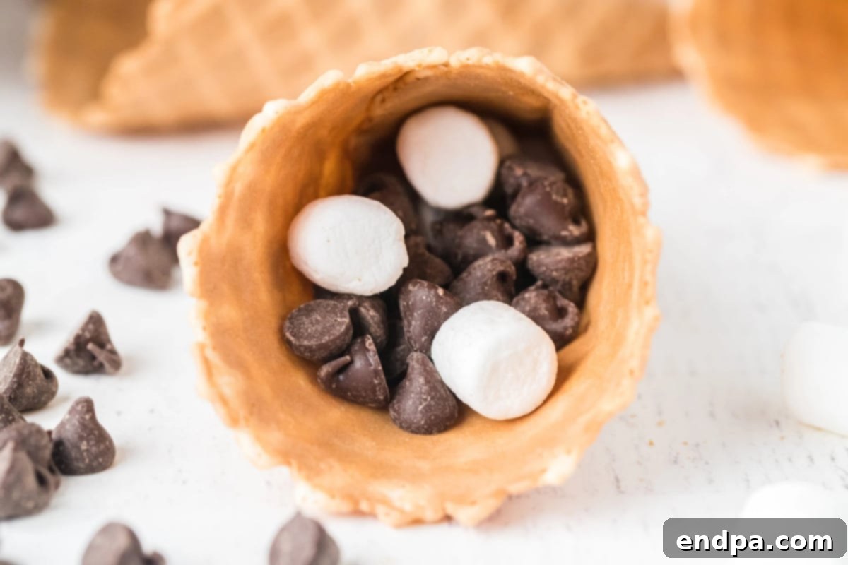 Cone packed with chocolate and marshmallows.