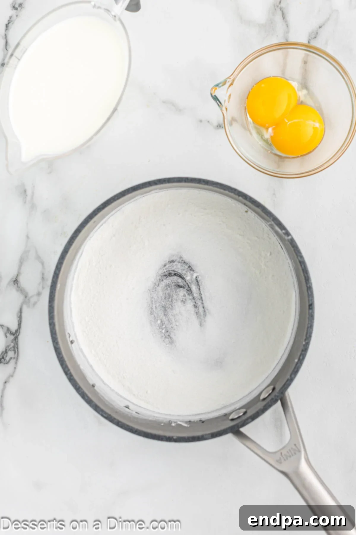 Granulated sugar and cornstarch combined in a medium saucepan.