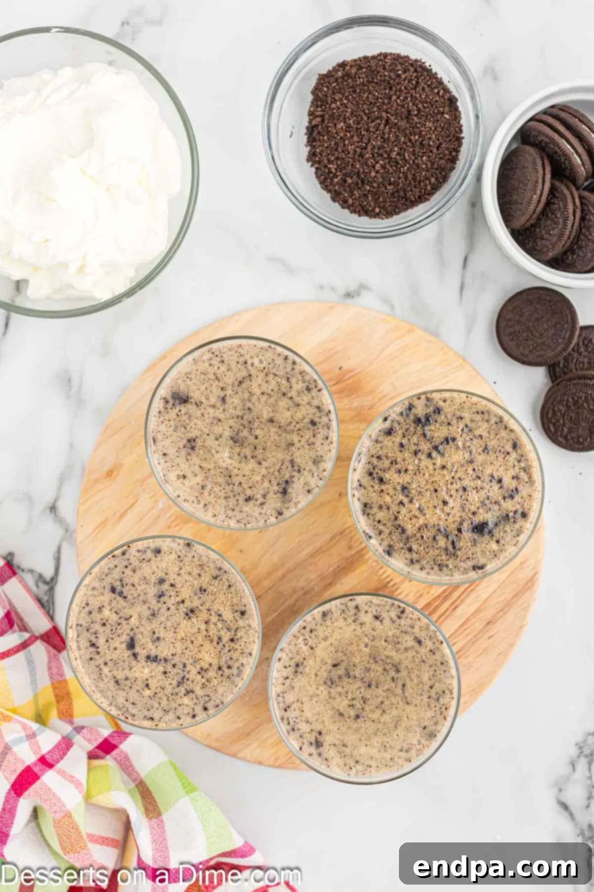 Oreo pudding portioned into individual serving cups.