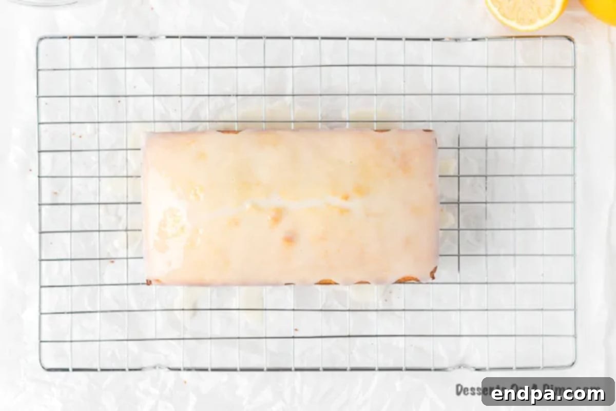 Lemon pound cake with lemon glaze, sliced and ready to be enjoyed.
