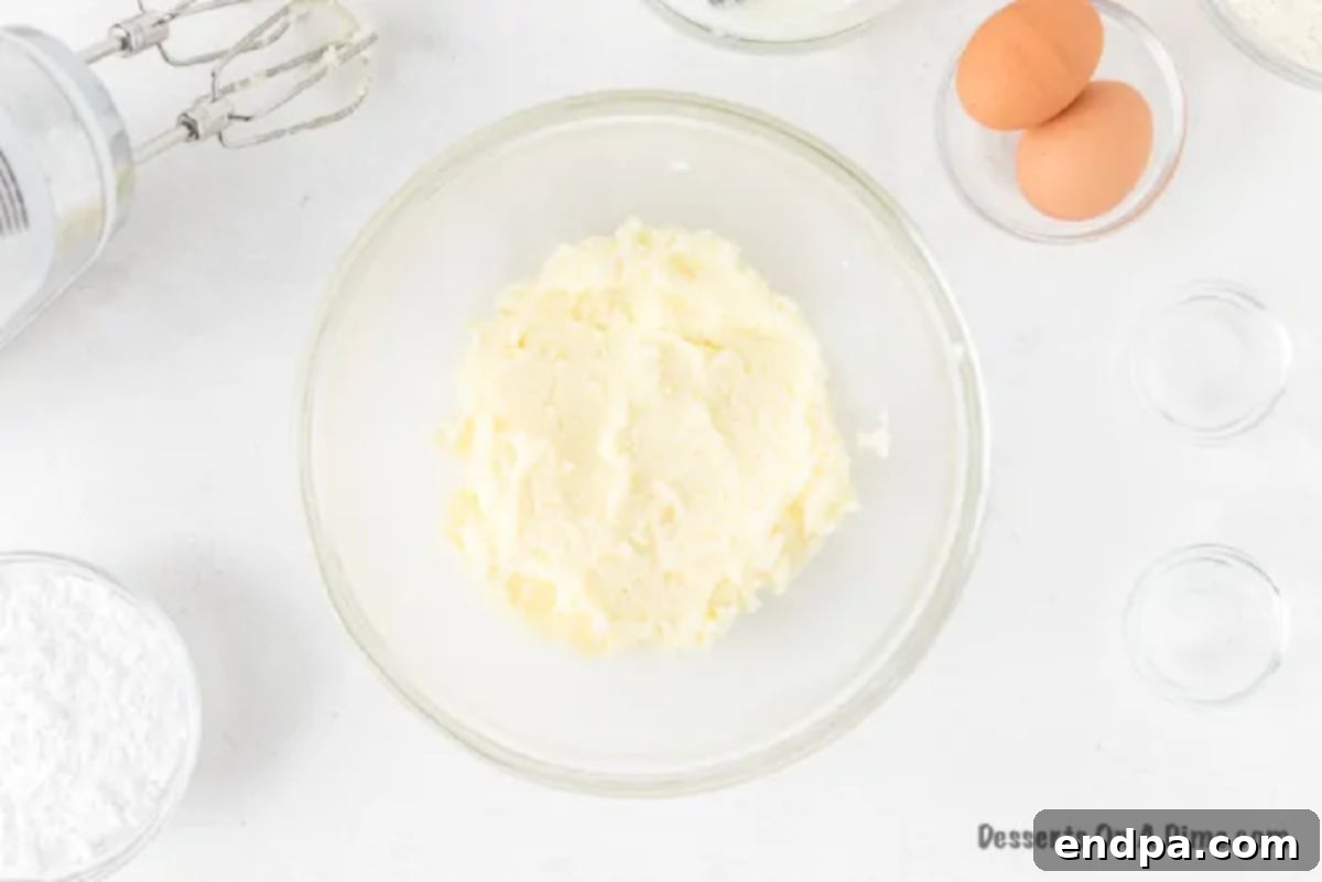 Creamy mixture of butter and sugar after being beaten together in a bowl.