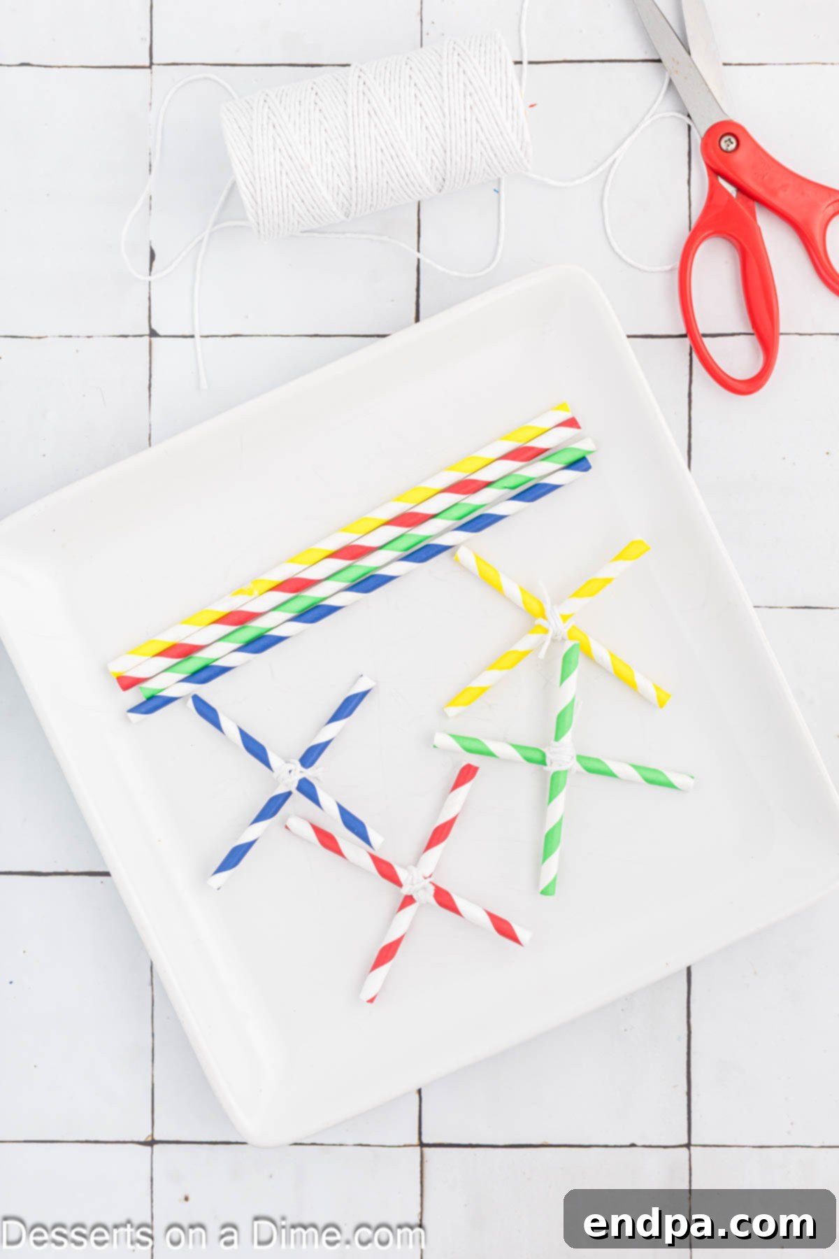 Growing Sweet Rock Candy Crystals 12 Multiple rock candy sticks drying on a rack made of straws, preventing them from touching.