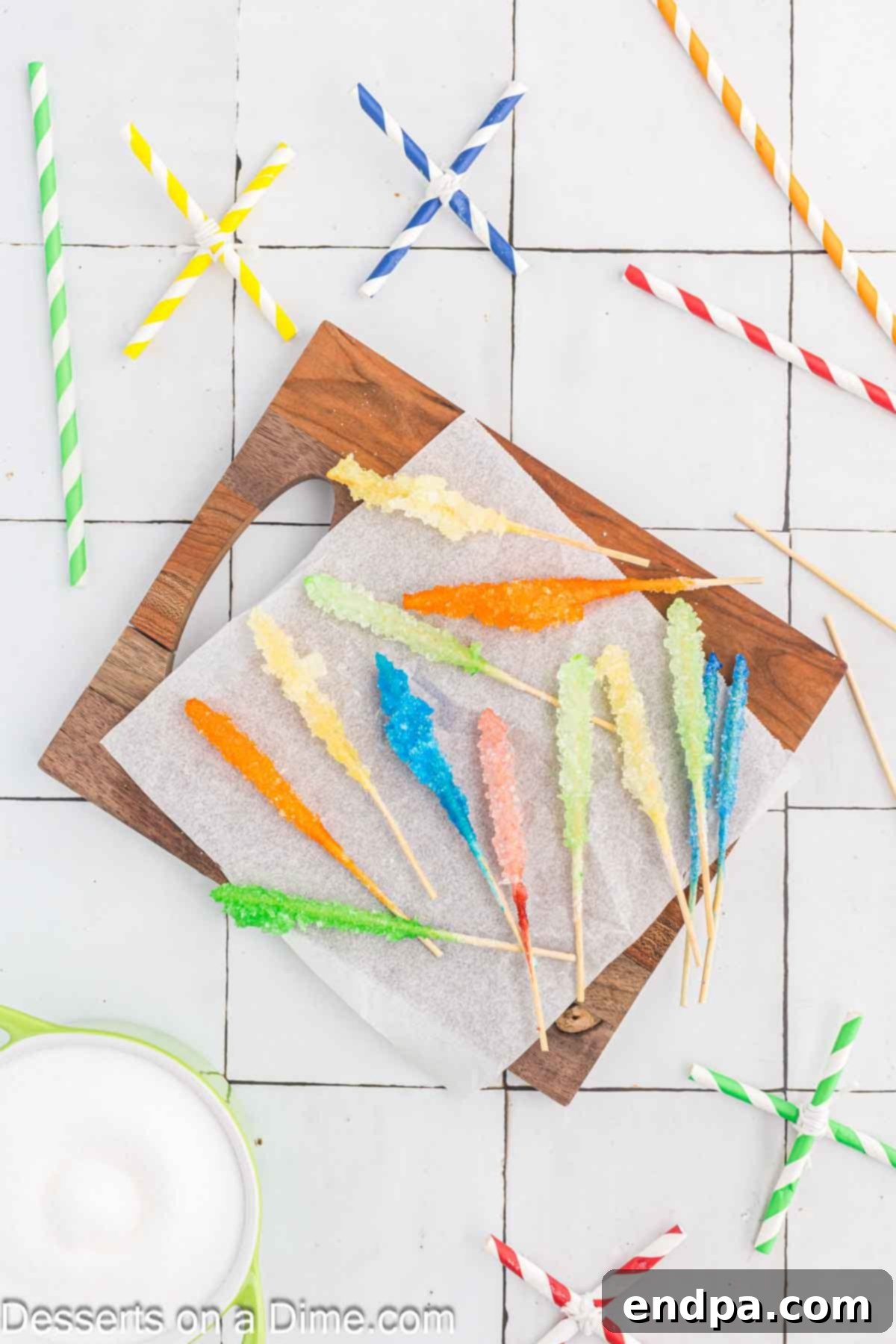 Growing Sweet Rock Candy Crystals 13 Finished rock candy sticks arranged on wax paper, ready to be enjoyed.
