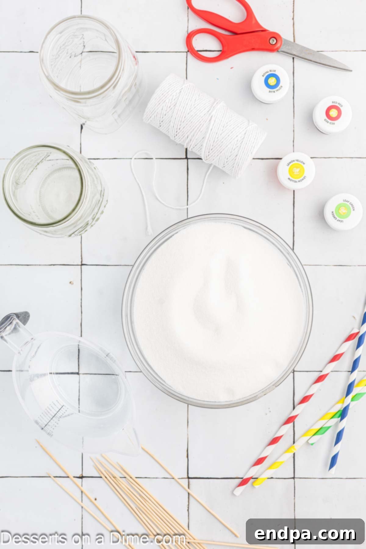 Growing Sweet Rock Candy Crystals 3 Essential ingredients for rock candy: granulated sugar, liquid food coloring, and a bottle of flavoring oil.