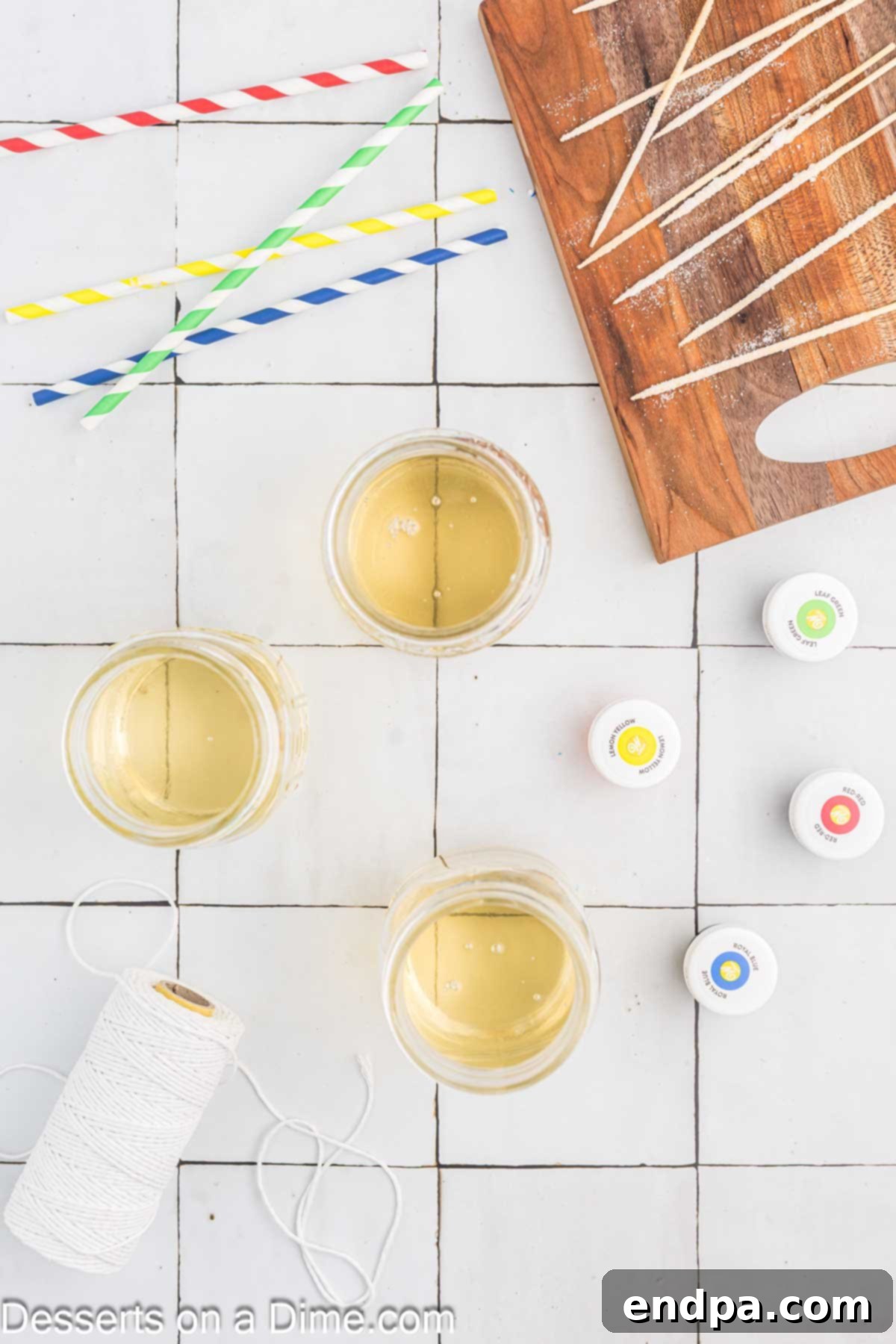 Growing Sweet Rock Candy Crystals 6 Hot sugar mixture being carefully poured into clean glass jars.