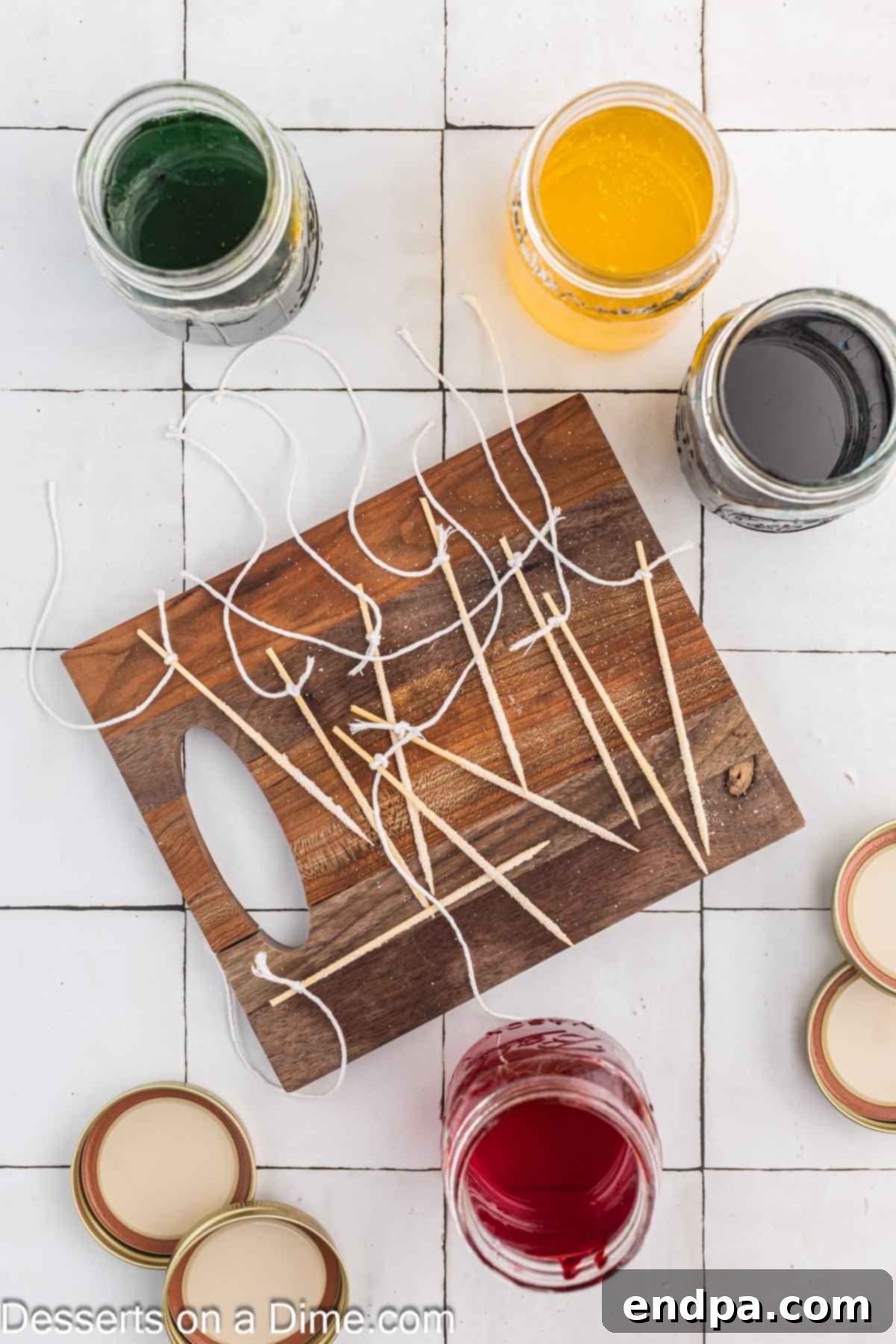 Growing Sweet Rock Candy Crystals 9 Skewers suspended in glass jars with lids, allowing crystals to grow.