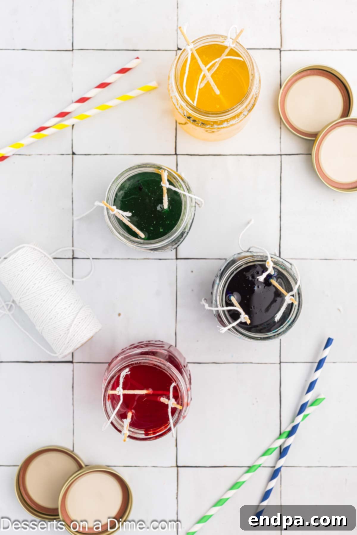 Growing Sweet Rock Candy Crystals 10 Sugar crystals visibly forming and growing on a skewer submerged in a glass jar.