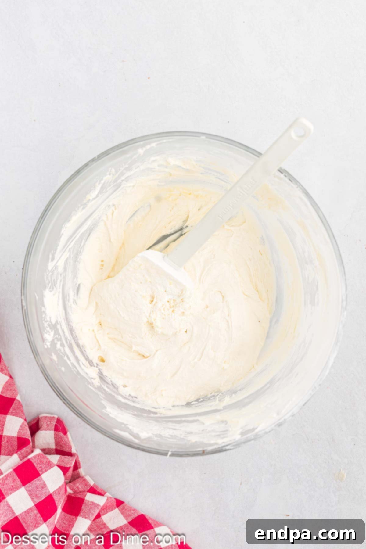 Frosting ingredients combined in a bowl.