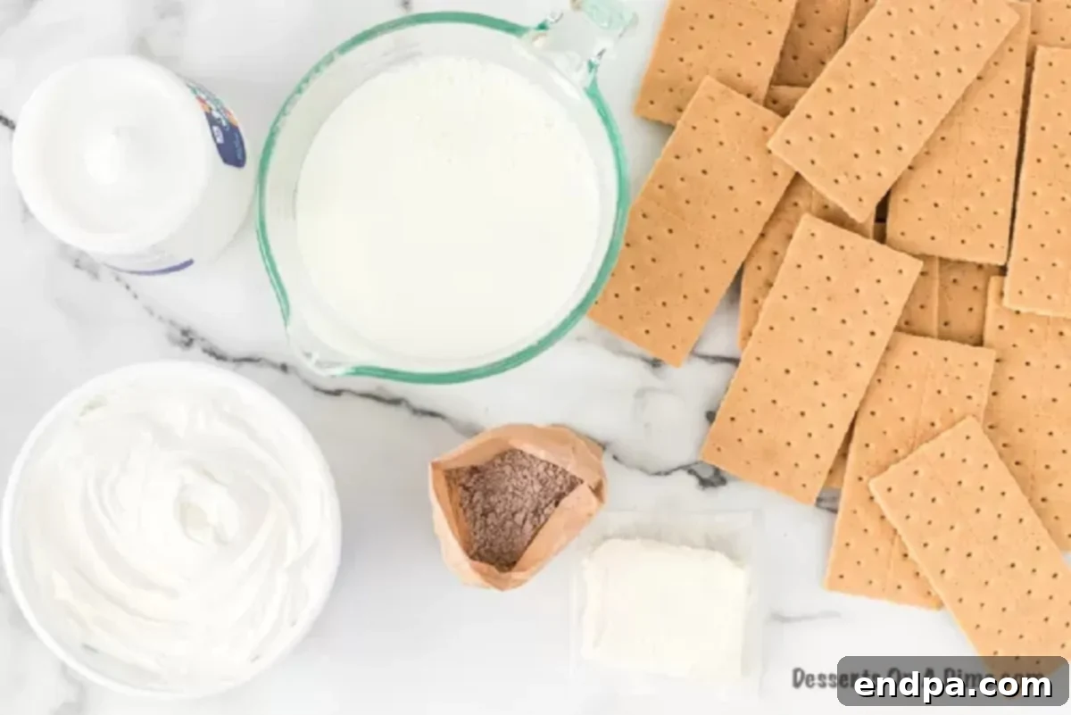 Smores Freeze 3 Ingredients needed for Frozen S'mores: chocolate pudding, milk, graham crackers, marshmallow creme, cream cheese, cool whip.