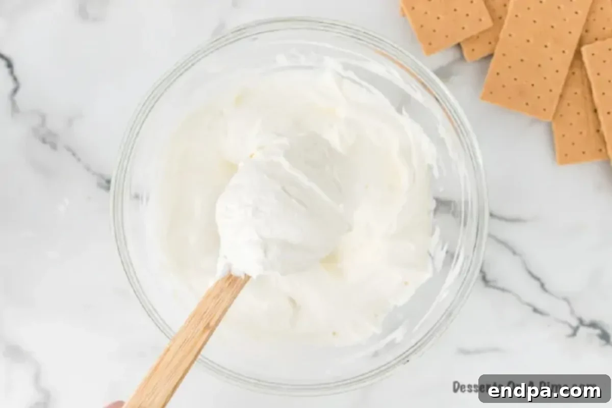 Smores Freeze 5 Marshmallow mixture in a mixing bowl, smooth and well combined.