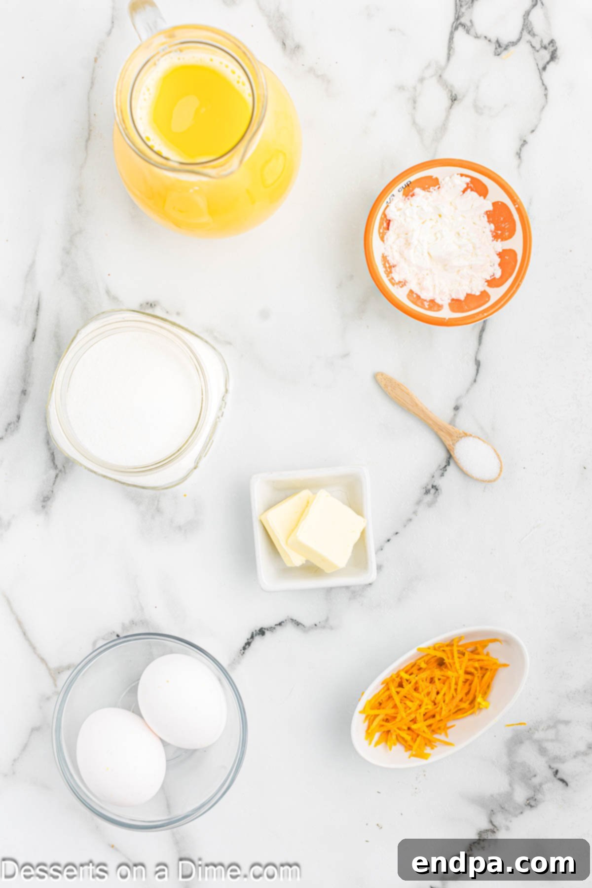 Ingredients for Orange Pudding - cornstarch, orange juice, orange zest, butter, eggs.