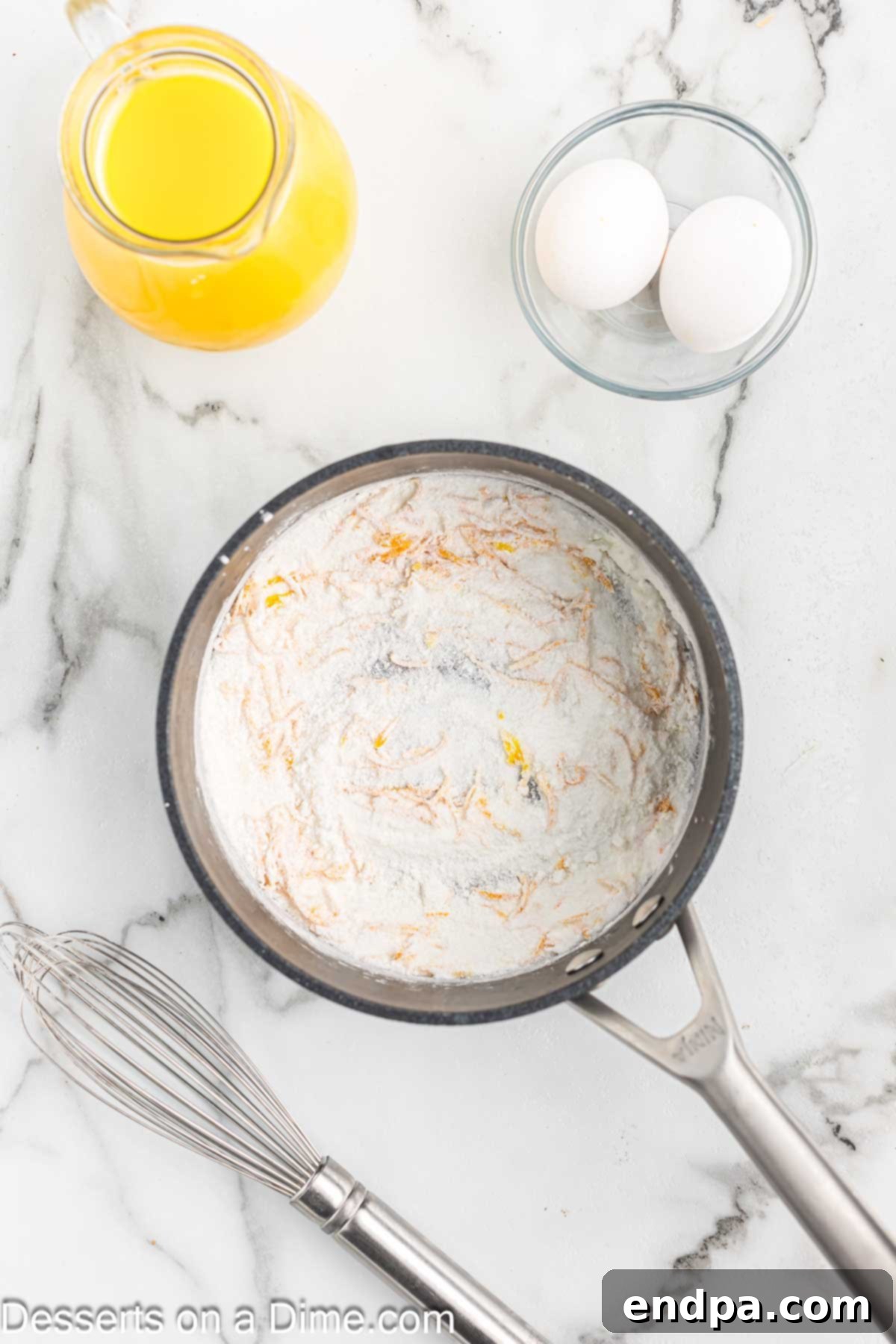 Saucepan with sugar, cornstarch, salt and orange zest.