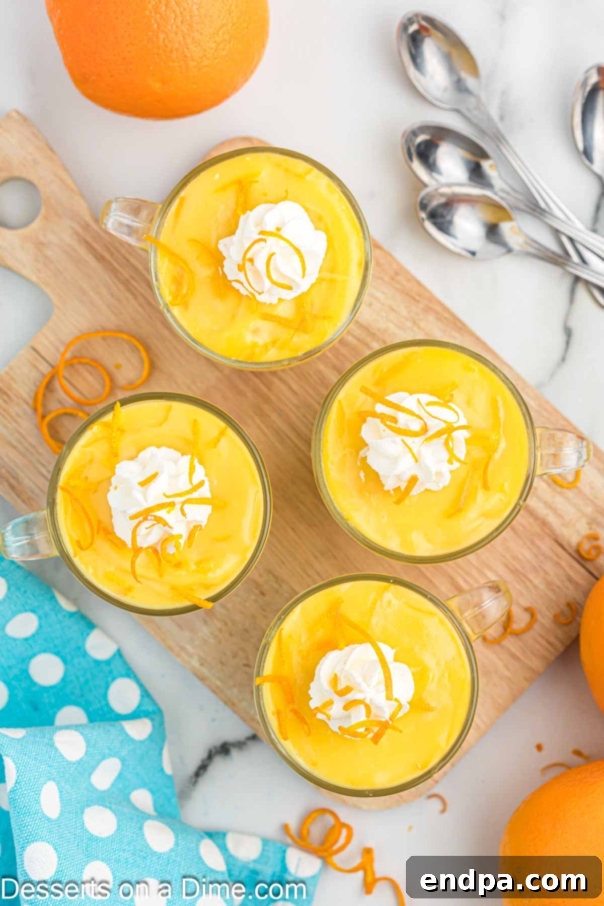 Whipped cream dolloped on each serving of pudding.