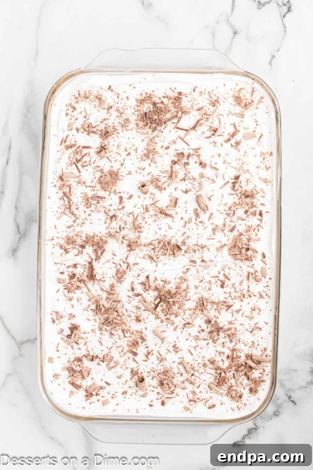 Decadent French Silk Brownies 11 Whipped cream and chocolate shavings spread on top of French Silk layer.