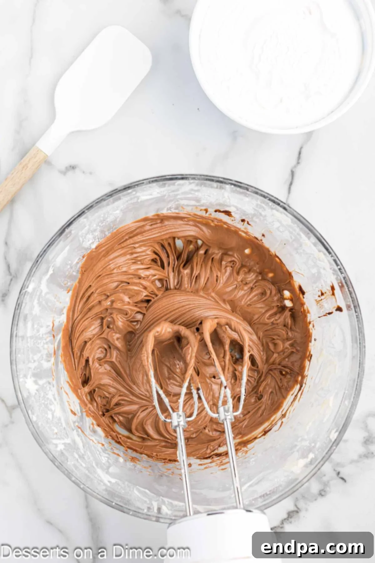 Decadent French Silk Brownies 9 Chocolate melted and combined into mixture.