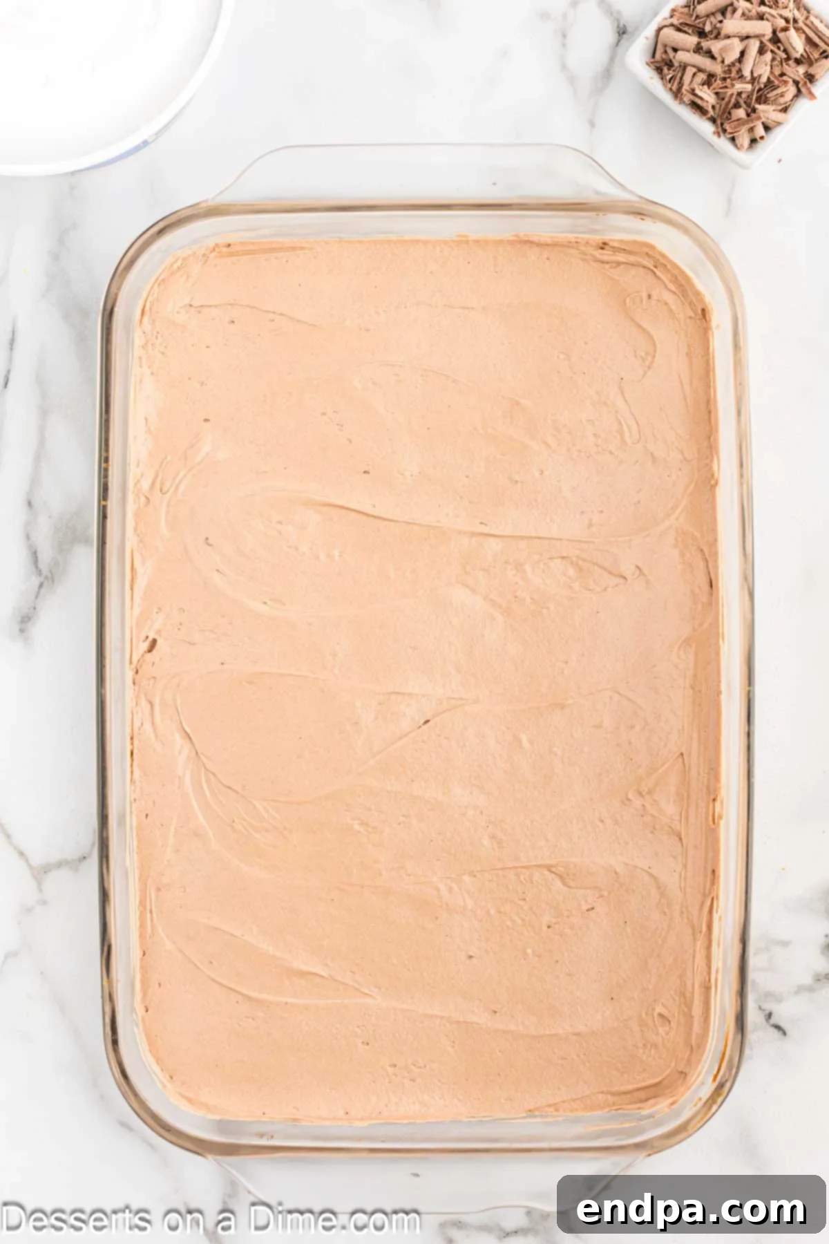 Decadent French Silk Brownies 10 French Silk Layer spread on brownies.