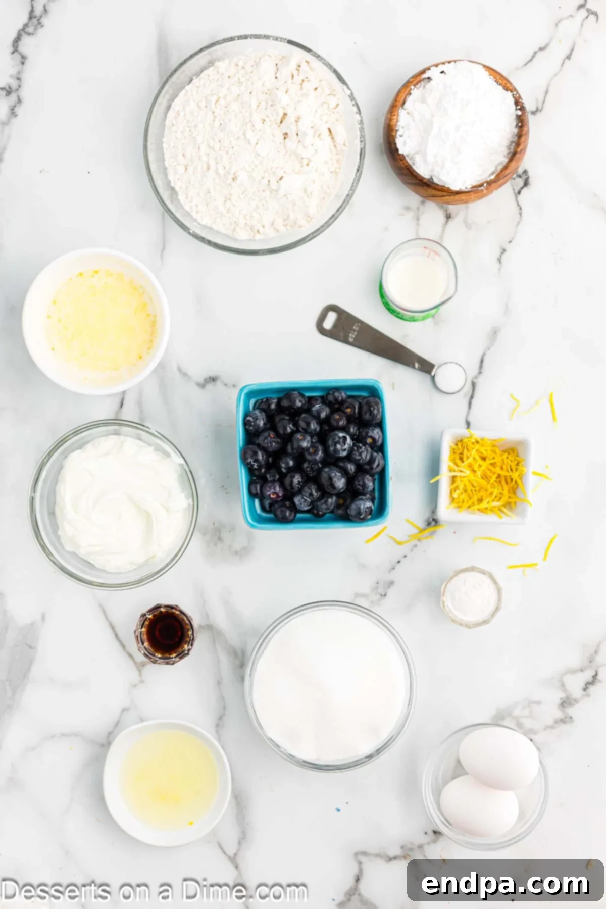 Ingredients for Lemon Blueberry Bread: lemon zest, Greek Yogurt, fresh lemon juice, blueberries, powdered sugar, flour, vanilla extract, butter, eggs, baking powder, salt.