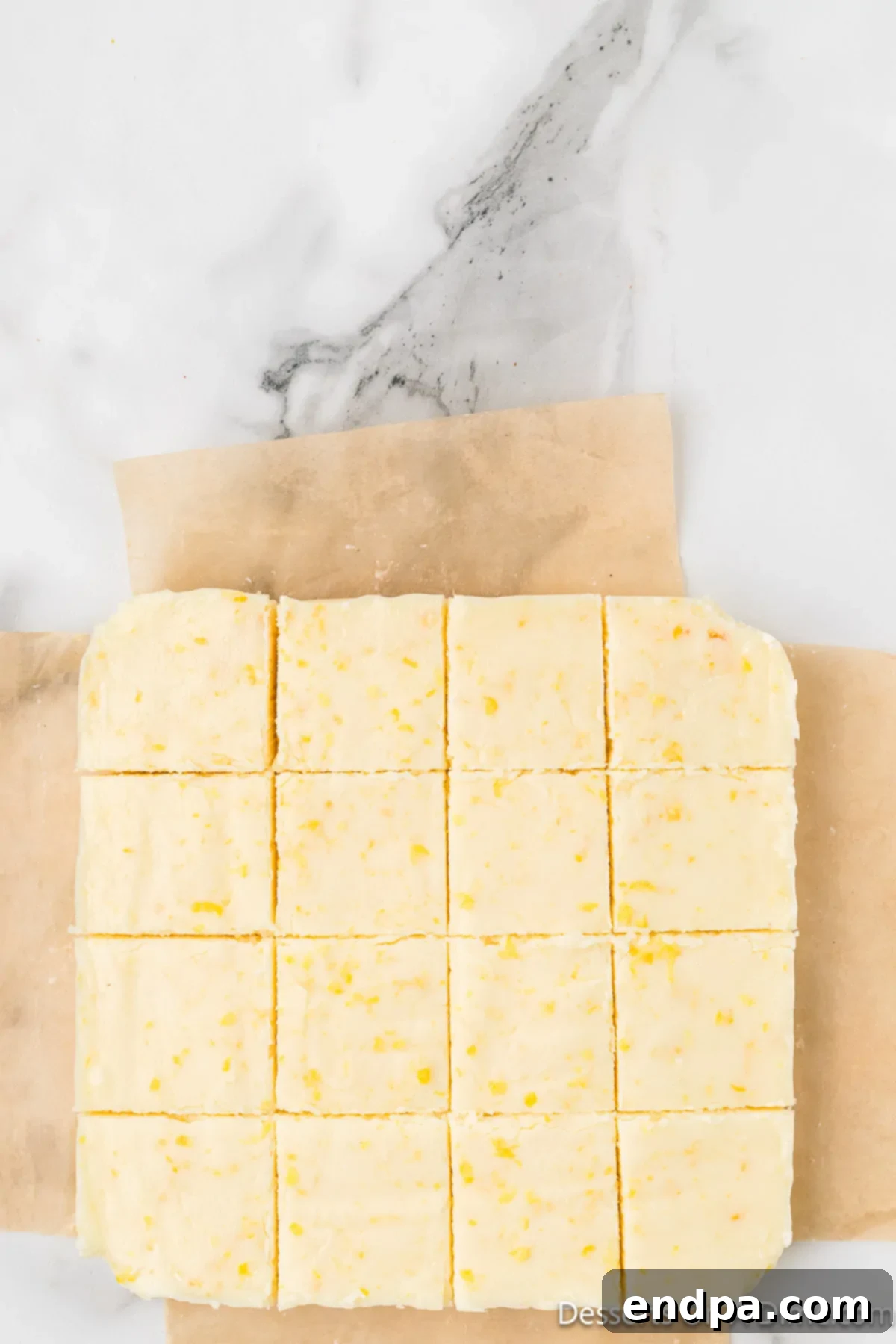 Set lemon fudge, cut into neat squares, ready for serving.