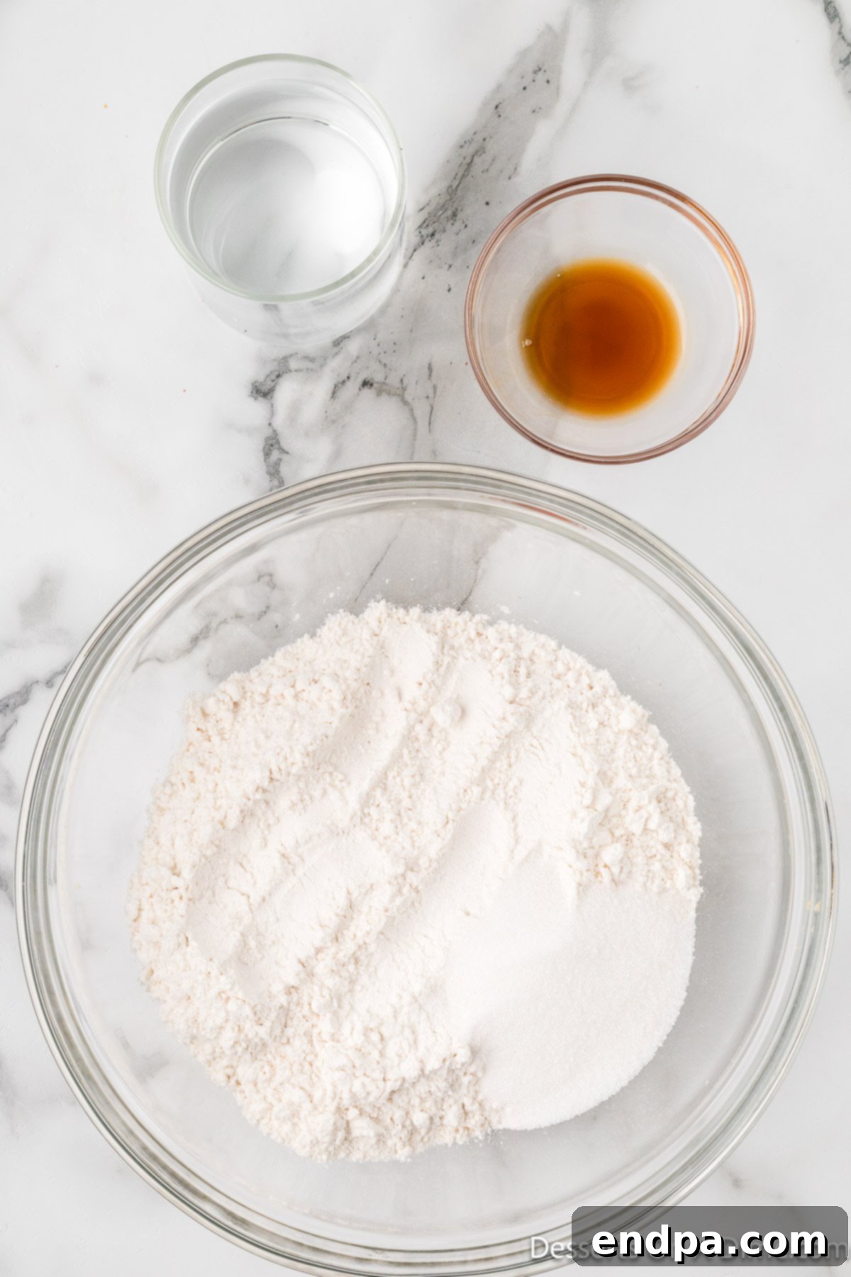 Bowl with pancake mix, sugar, vanilla.