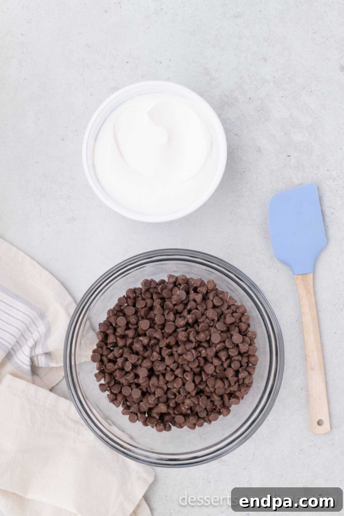 Chocolate chips in a bowl, ready to be melted.