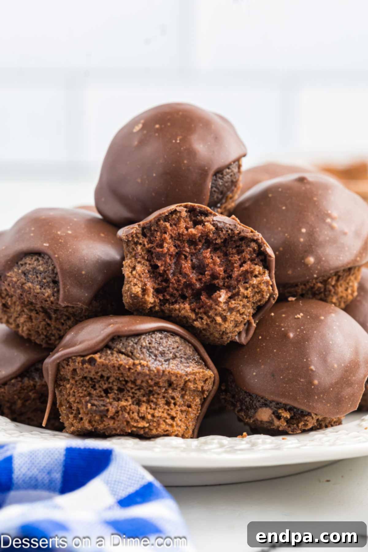 Texas Sheet Cake Minis 2 Decadent Texas Sheet Cake Bites elegantly arranged on a serving platter, ready for any party or gathering.