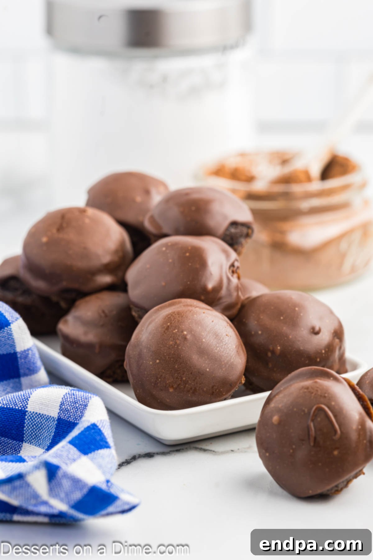 Texas Sheet Cake Minis 12 A festive platter of finished Texas Sheet Cake Bites, perfectly frosted and ready to be served at a gathering.