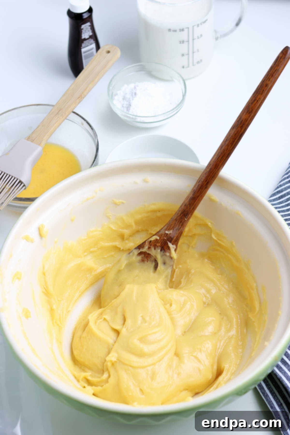 Irresistible Cream Puffs 3 Dough mixture combined together, showcasing the cohesive and uniform texture after all eggs are added.