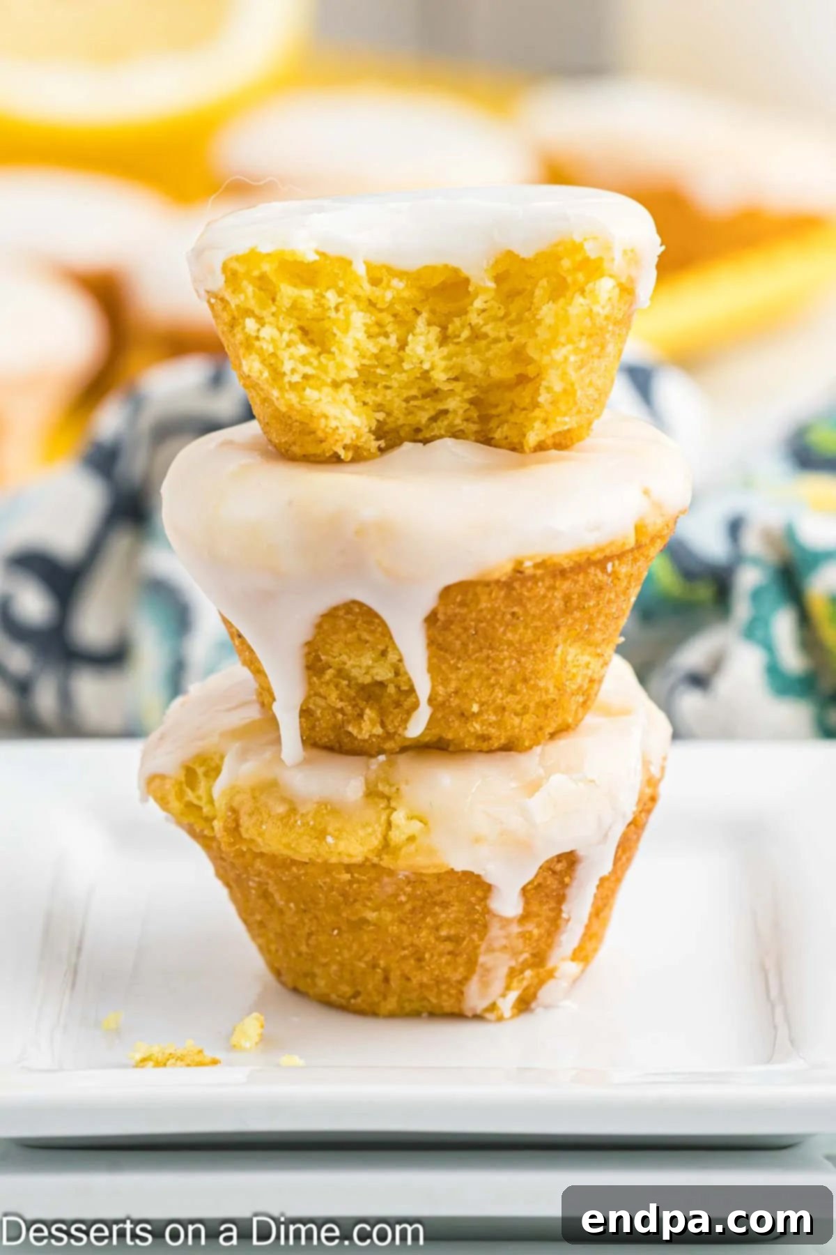 Delicious Lemon Blossoms, bite-sized lemon cakes with a zesty glaze.