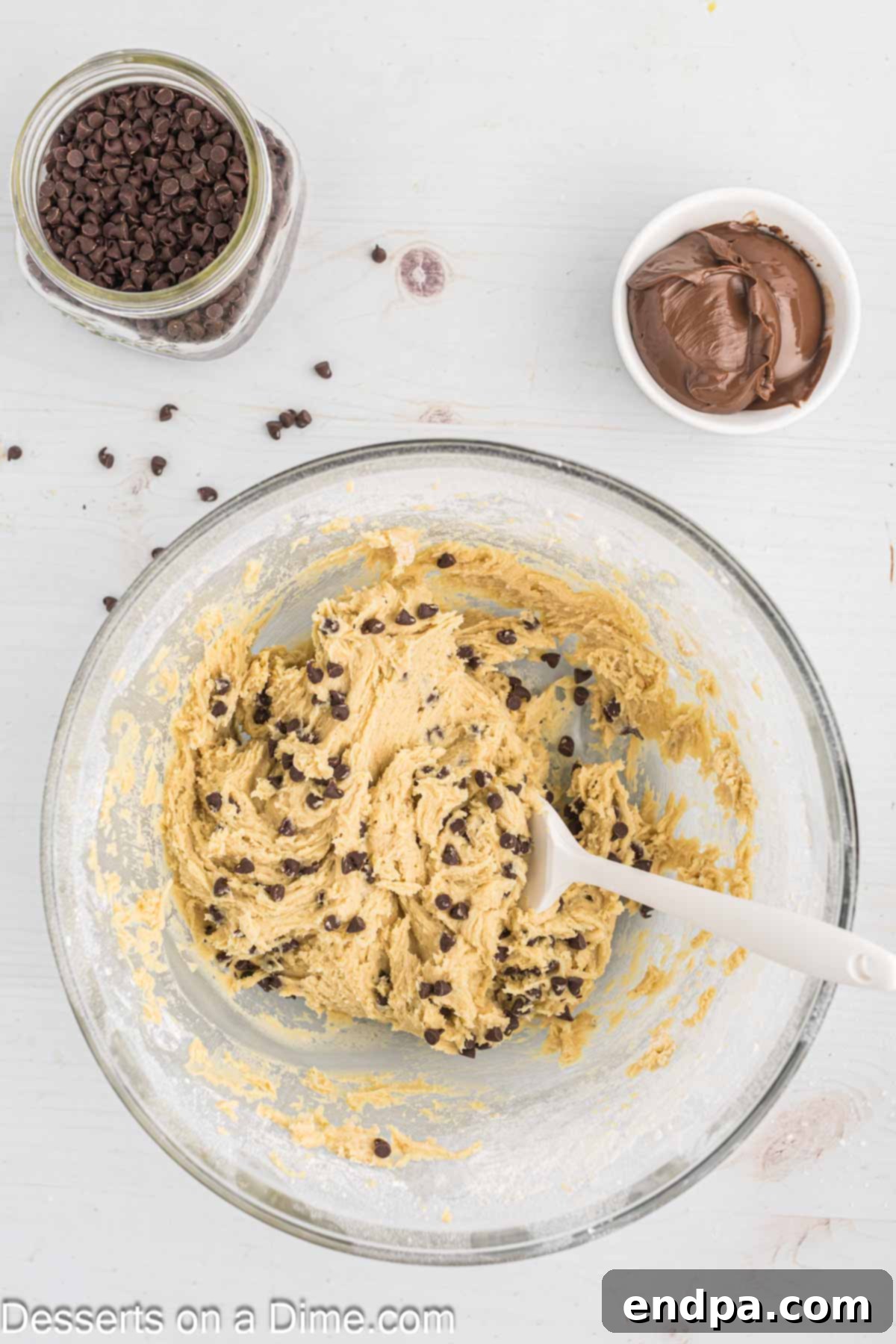 Decadent Nutella Bars 7 Mini semi-sweet chocolate chips folded into the cookie dough batter by hand.