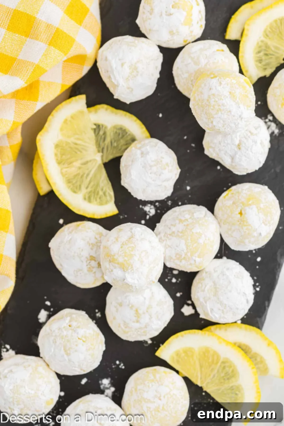 Finished Lemon Truffles arranged beautifully with fresh lemon slices for garnish.