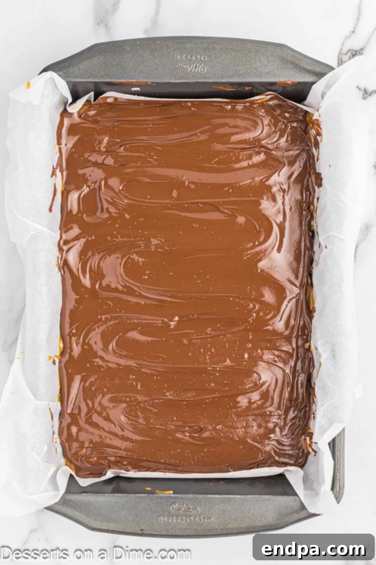 Chocolate layer spread on top.