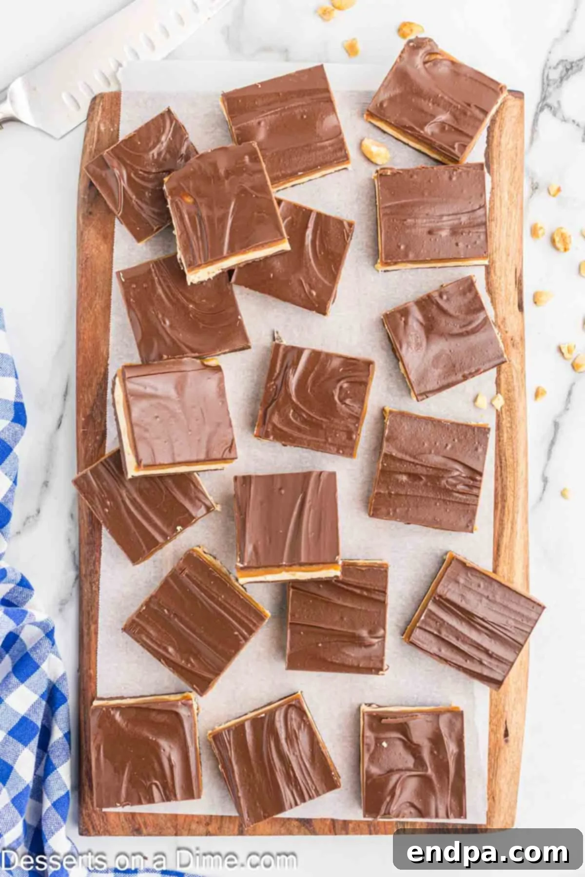 Snickers bars broken into squares for serving.