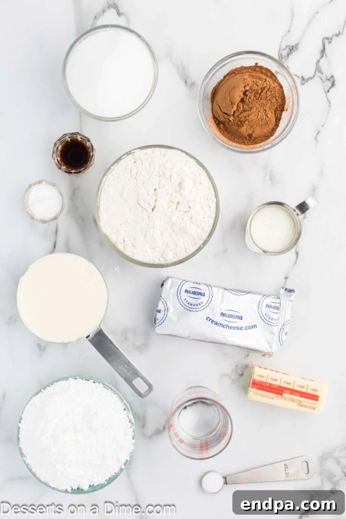 Ingredients for Chocolate Mayonnaise Cake including mayonnaise, flour, baking soda, vanilla, cream cheese, confectioners' sugar, and heavy cream.